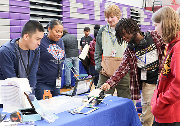 Students master the crane, command the dock at Engineering Design Challenge